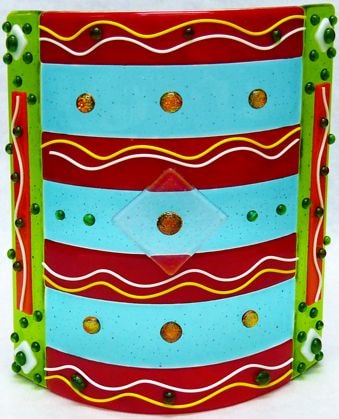 Iron Fuser 4 Moroccan Bazaar — curved fused glass piece with bold red, turquoise, and green stripes, gold dichroic dots, and glass bead accents.